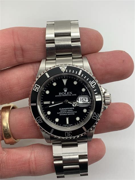 rolex 16610 submariner holes